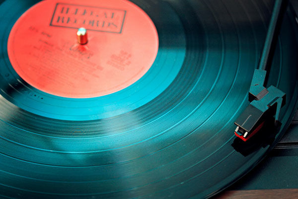 Aqua vinyl playing on a record player