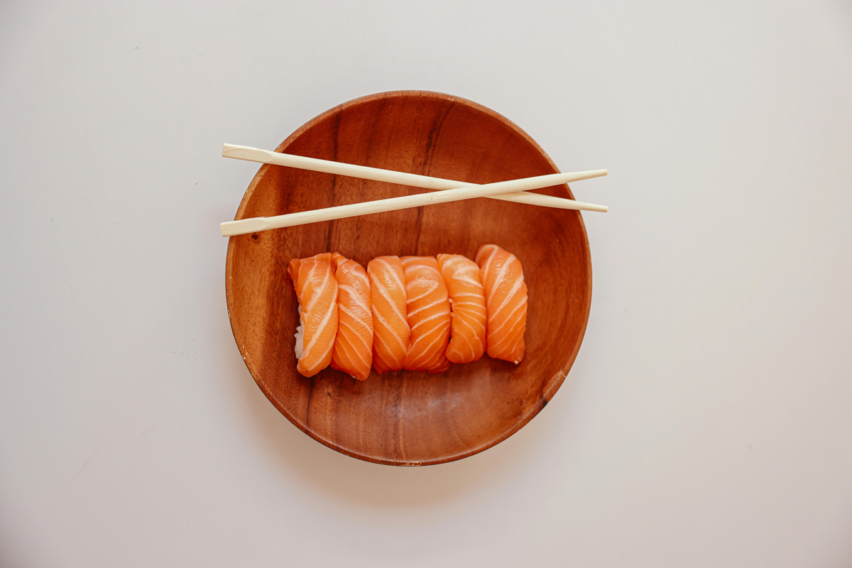 Bowl of sushi and chopsticks